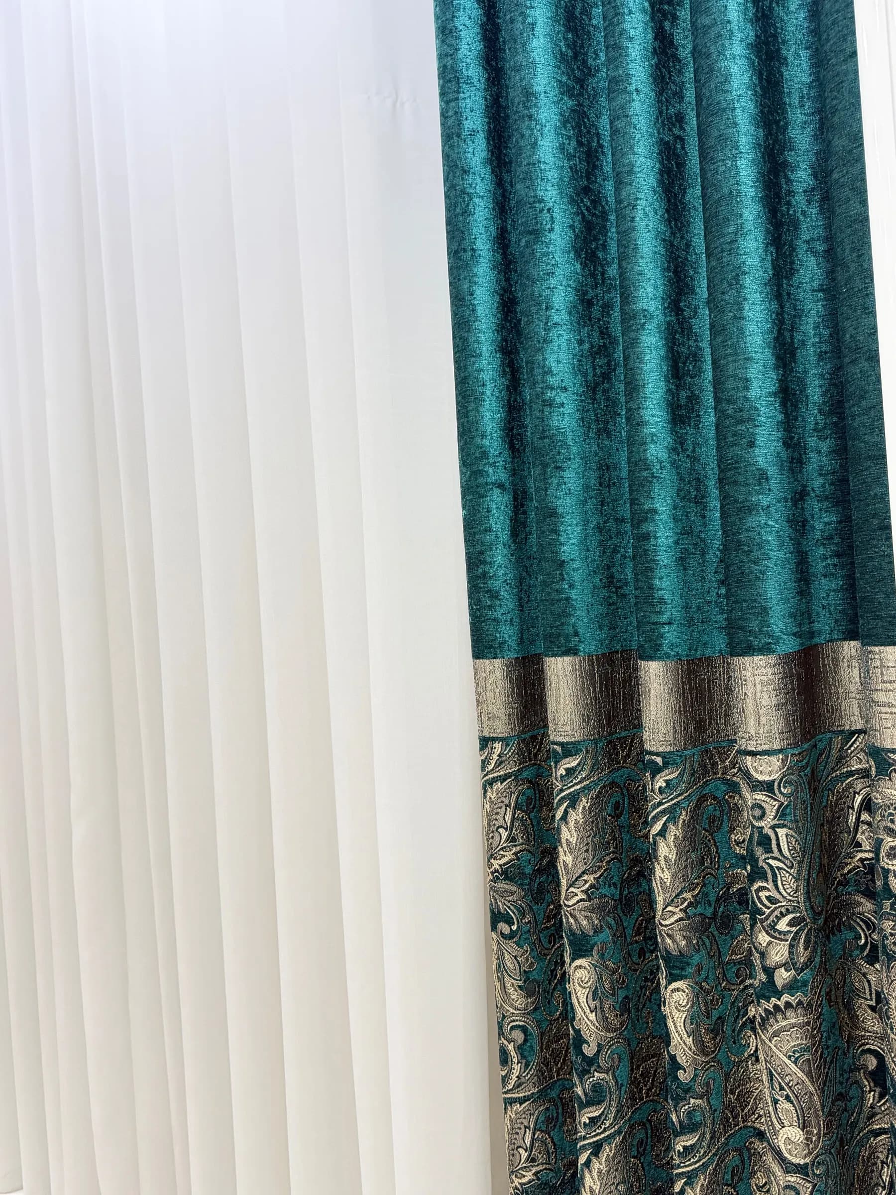 Ivory linen roman blinds with soft folds in a dining room